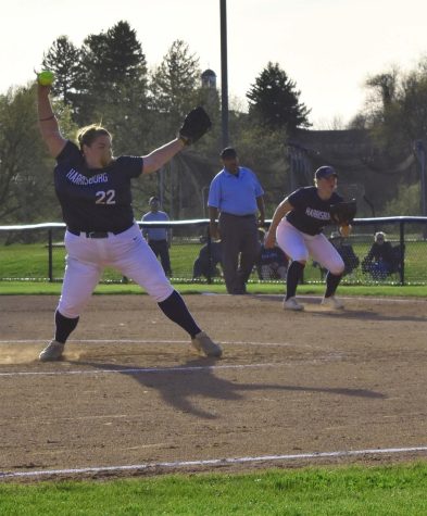 Mary Kate Penczkowski (L) winds up as Steph Reider sets for a ground play