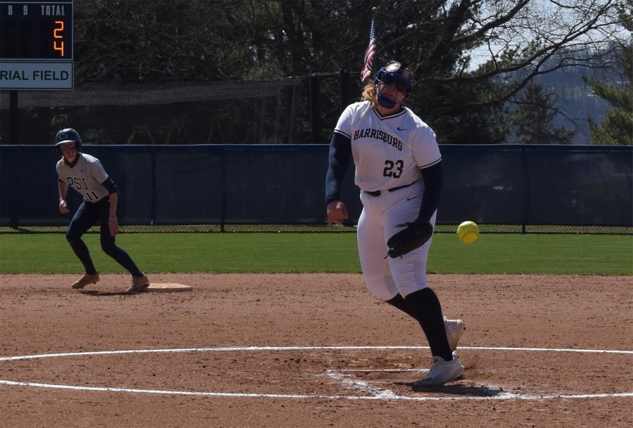 Carissa Yeager (right) makes a pitch during the first game of a doubleheader against Penn State Abington.
