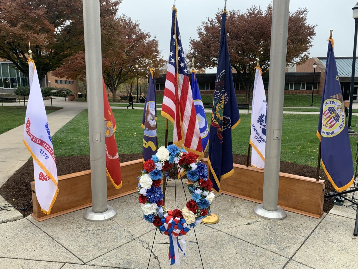 American+and+Military+Flags+set+up+with+wreath+to+honor+veterans